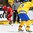 GRAND FORKS, NORTH DAKOTA - APRIL 23: Canada's Maxime Comtois #12 skates with the puck while Sweden's Jacob Cederholm #3 defends during semifinal round action at the 2016 IIHF Ice Hockey U18 World Championship. (Photo by Matt Zambonin/HHOF-IIHF Images)

